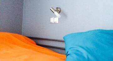 Кровать в общем четырехместном номере для мужчин и женщин в Хостеле Bugel